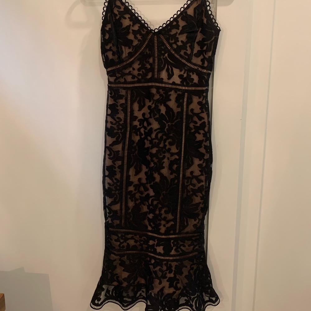 Black lace and nude body con dress by Lulus.